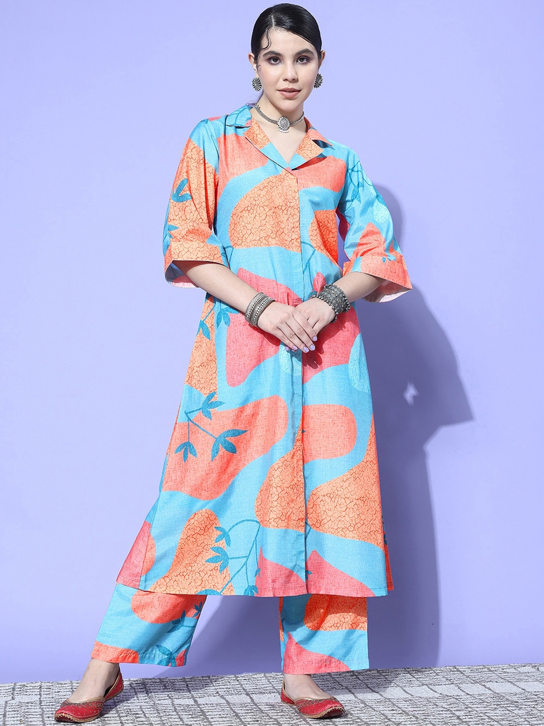 

KALINI Abstract Printed Shirt Collar Flare Sleeves A-Line Kurta With Palazzo, Turquoise blue