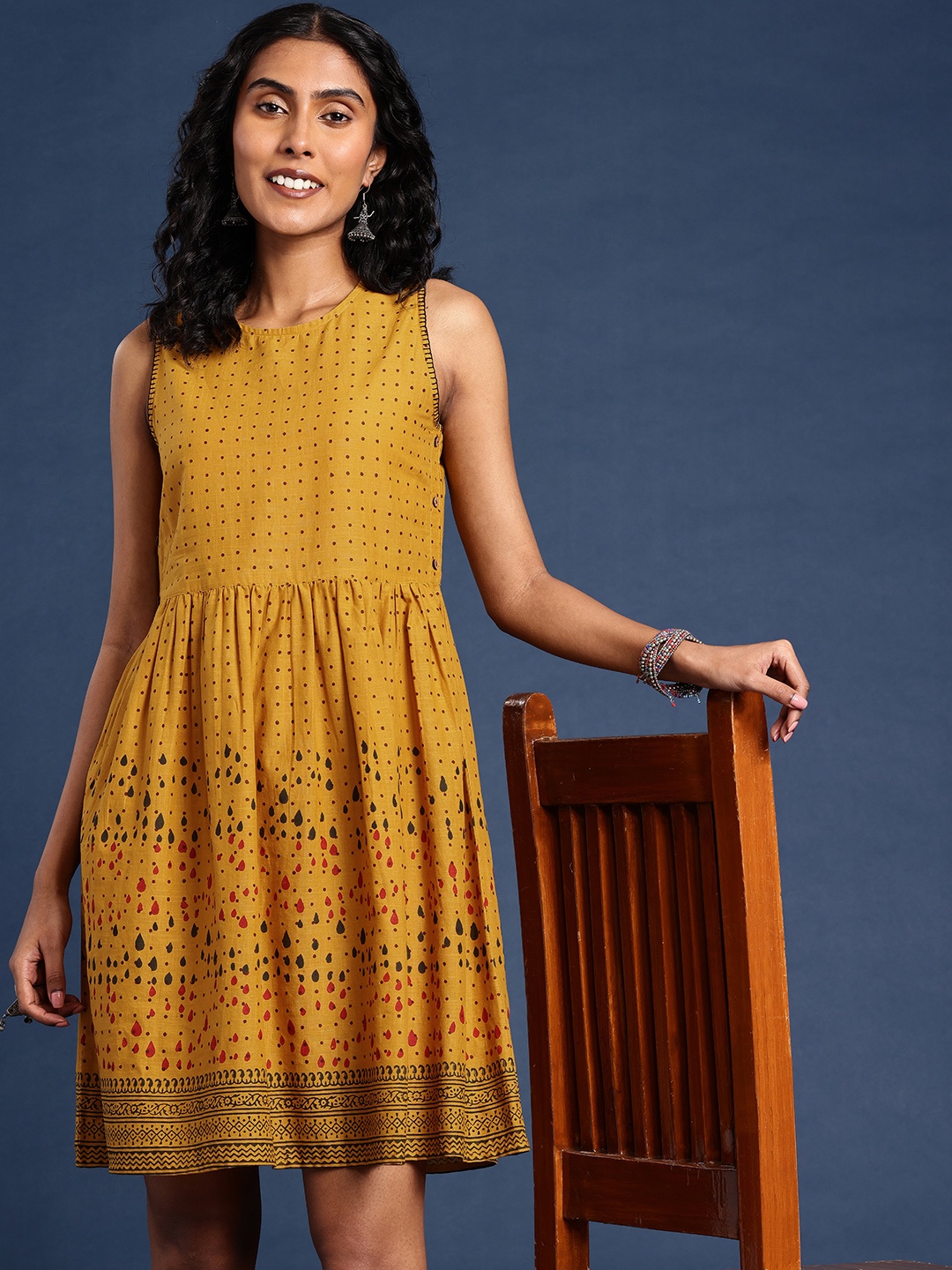 

Taavi Bagru Printed Printed A-Line Pure Cotton Ethnic Dresses, Mustard