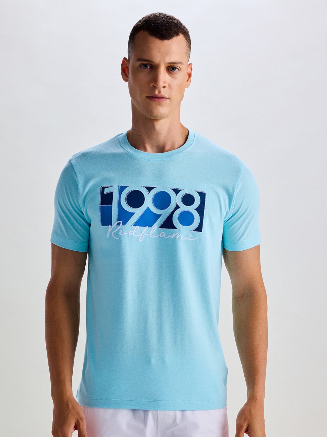 

Red Flame Men Typography Printed Pockets T-shirt, Blue