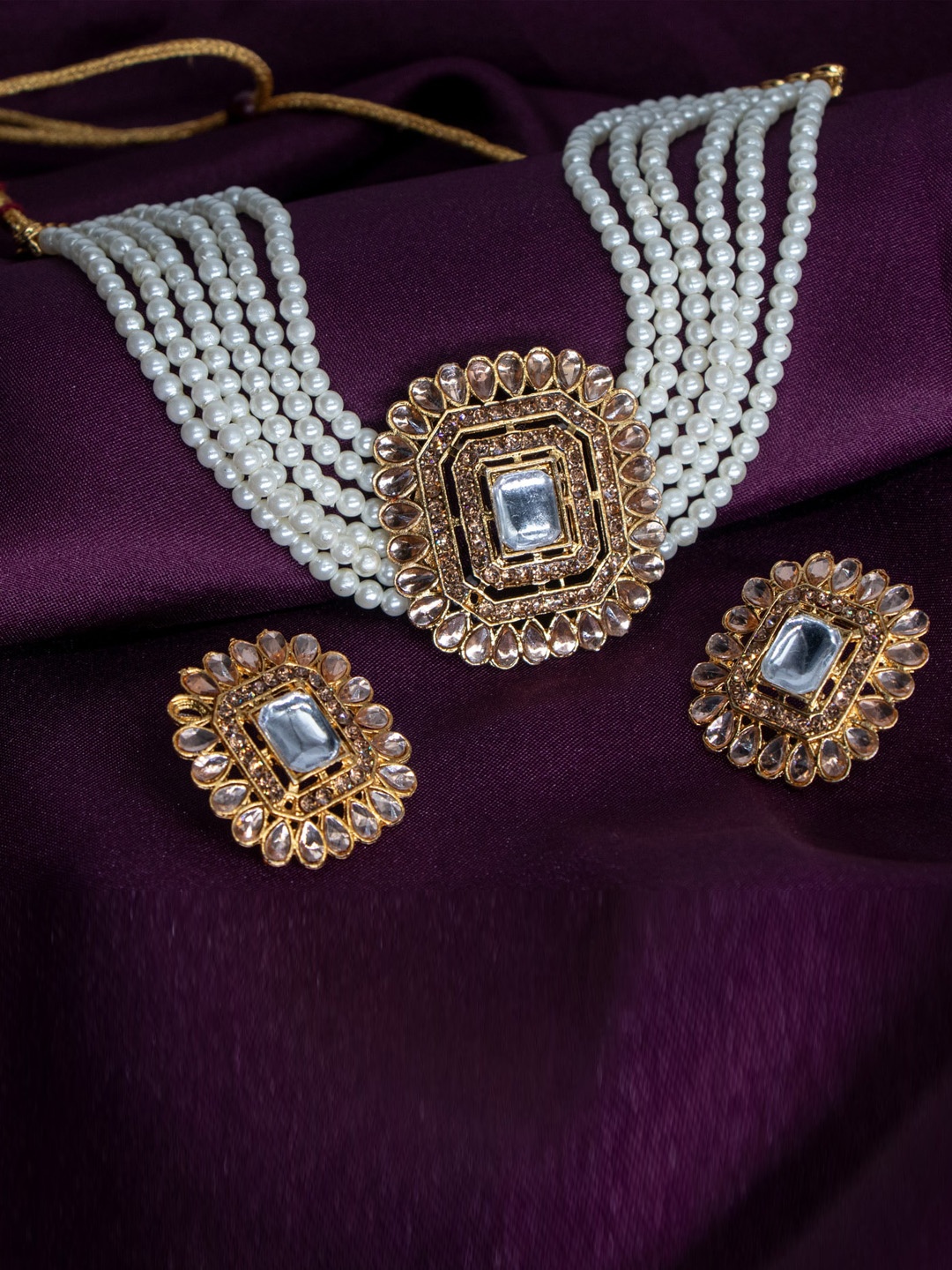 

Manikya Gold-Plated Stones Studded & Beaded Necklace And Earrings