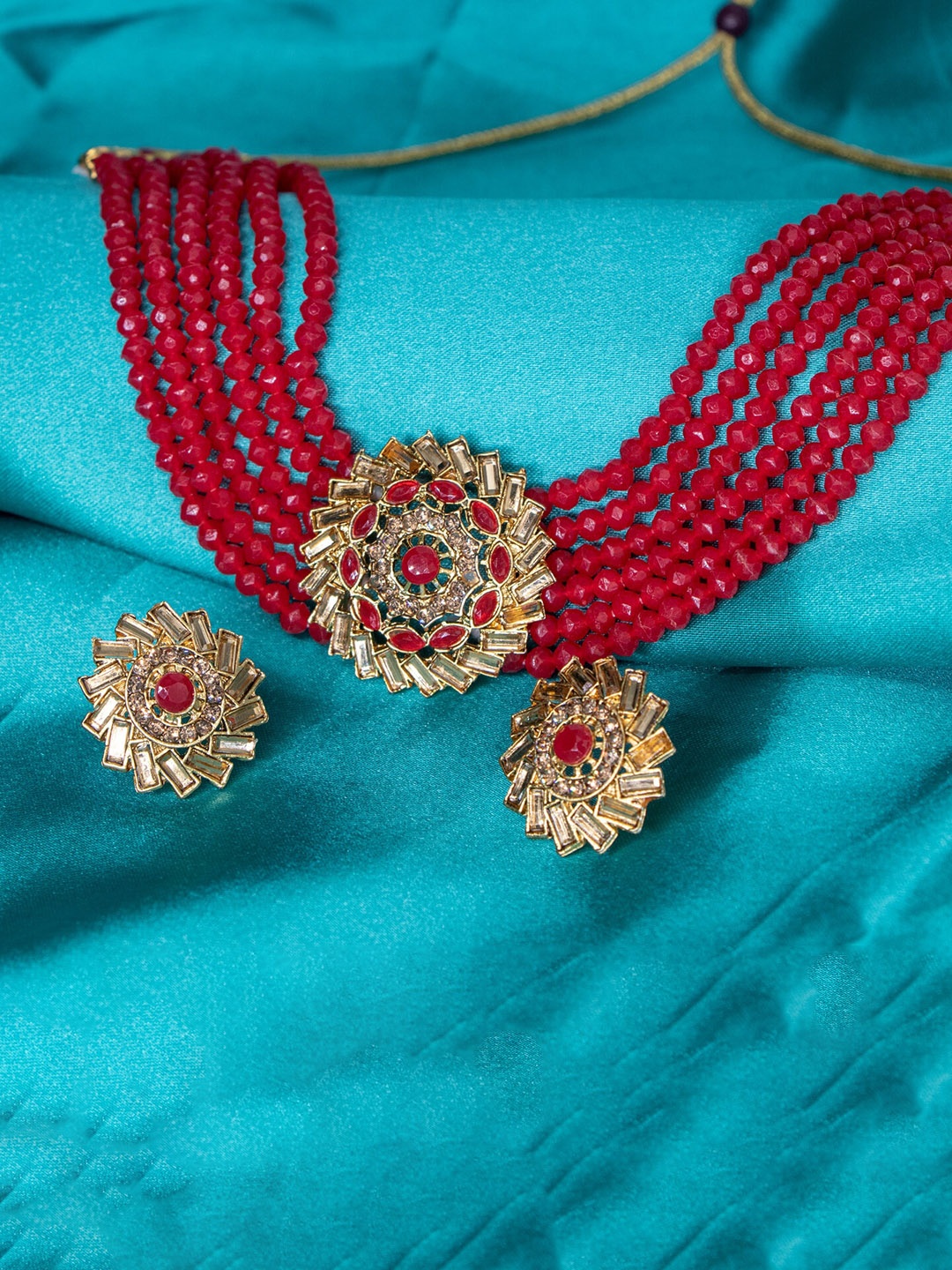 

Manikya Gold-Plated Stones Studded & Beaded Necklace And Earrings