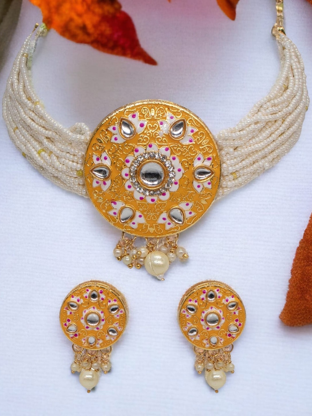 

Manikya Gold-Plated Stones Studded & Beaded Necklace And Earrings