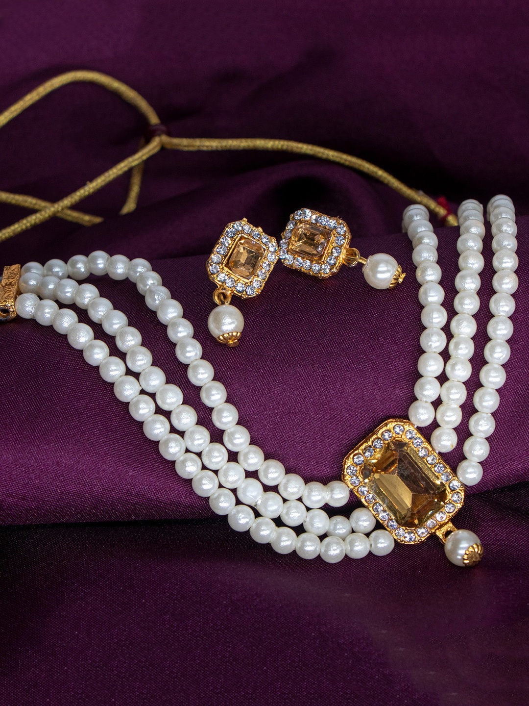 

Manikya Gold-Plated Artificial-Stones Studded & Beaded Necklace and Earrings