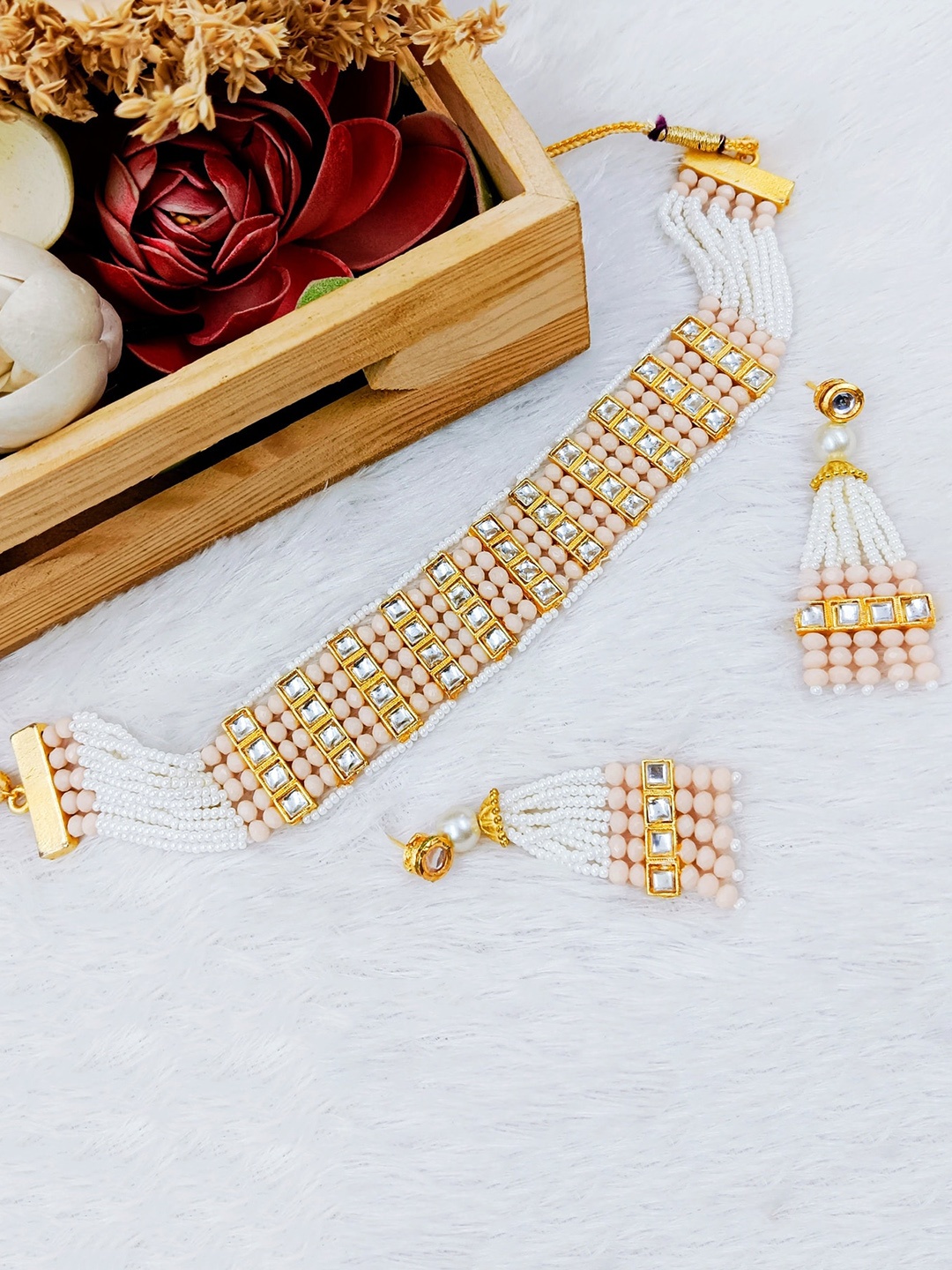 

Manikya Gold-Plated Stones Studded & Pearl Beaded Jewellery Set