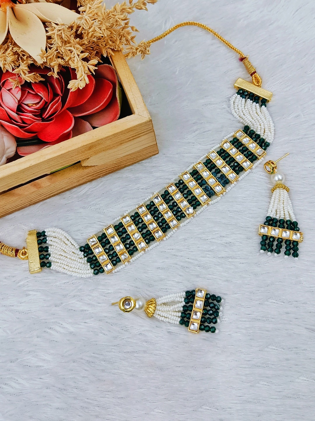 

Manikya Gold-Plated Stones Studded & Pearl Beaded Jewellery Set