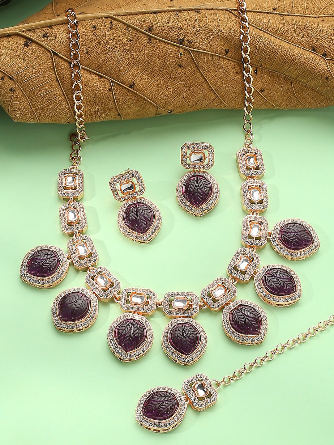 

VATSALYA creation Rose Gold-Plated Stones Studded Jewellery Set