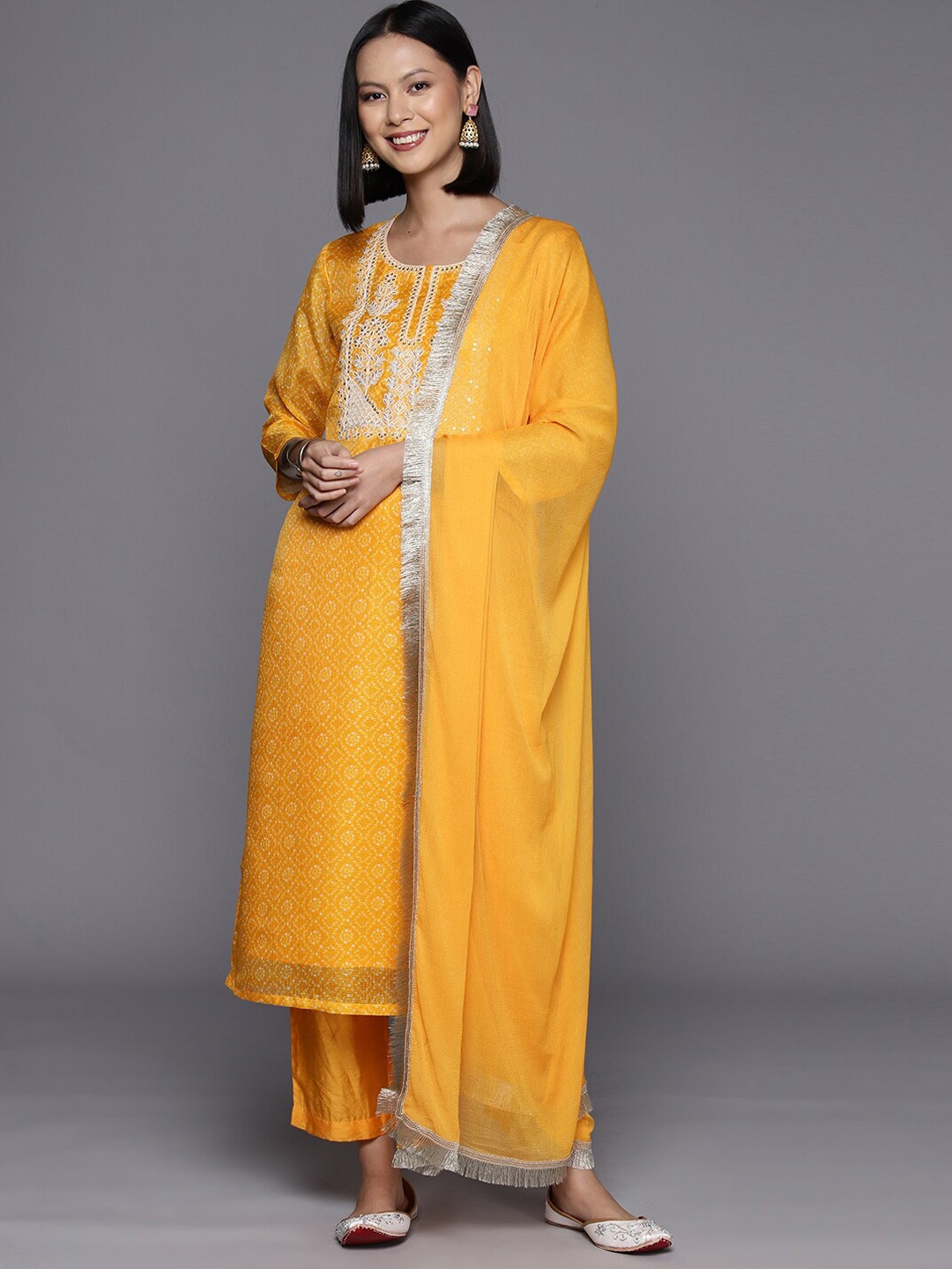 

KALINI Bandhani Printed Regular Sequinned Kurta with Trousers & With Dupatta, Mustard