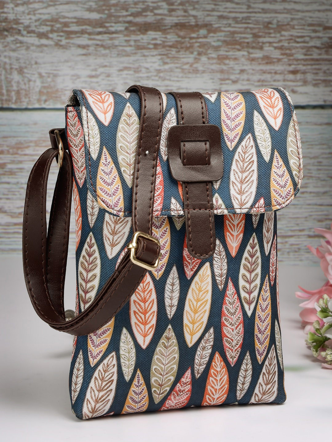 

Sangria Brown Floral Printed Swagger Sling Bag