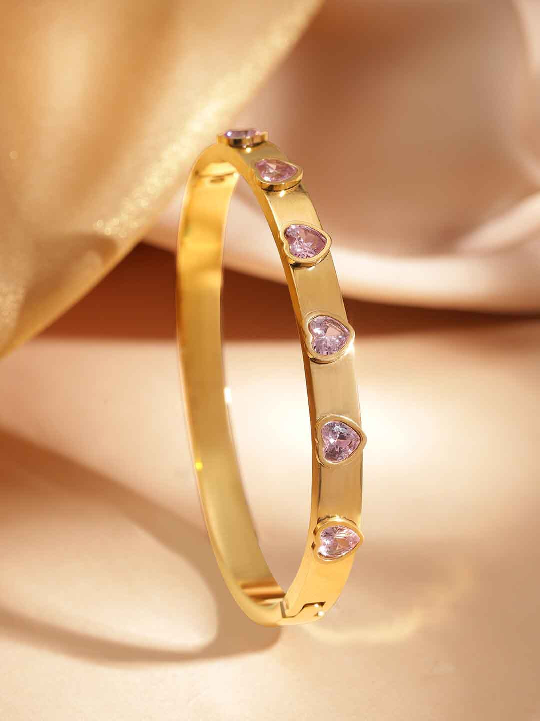 

Rubans Voguish 18k Gold plated Tarnish free water proof Heart mystic Bracelet