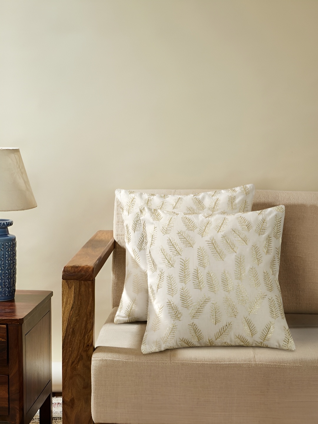

Ratan Cart Gold-Toned & White 2Pcs Embroidered Square Cushion Covers
