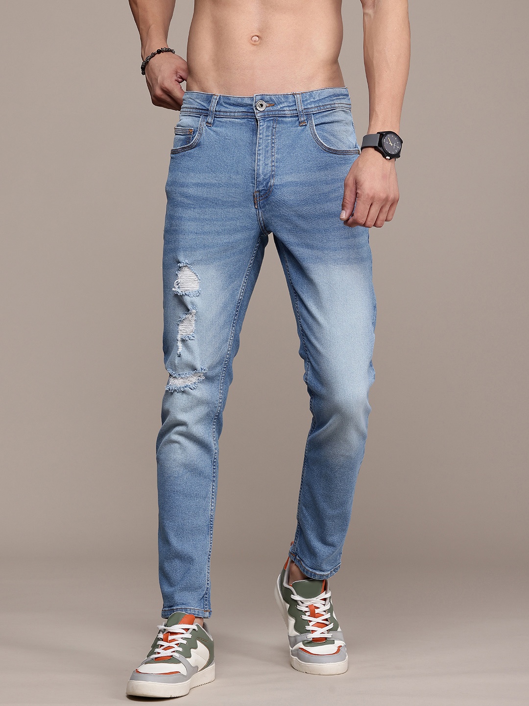

Roadster Men Relaxed Fit Mildly Distressed Heavy Fade Jeans, Blue