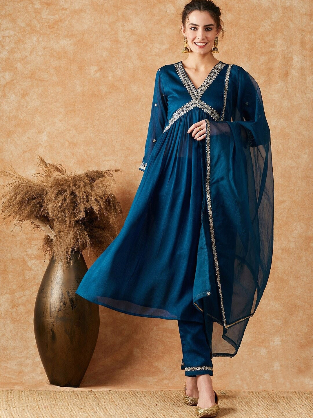 

NIZA FASHION V-Neck Embroidered Thread Work Kurta with Trousers & Dupatta, Turquoise blue