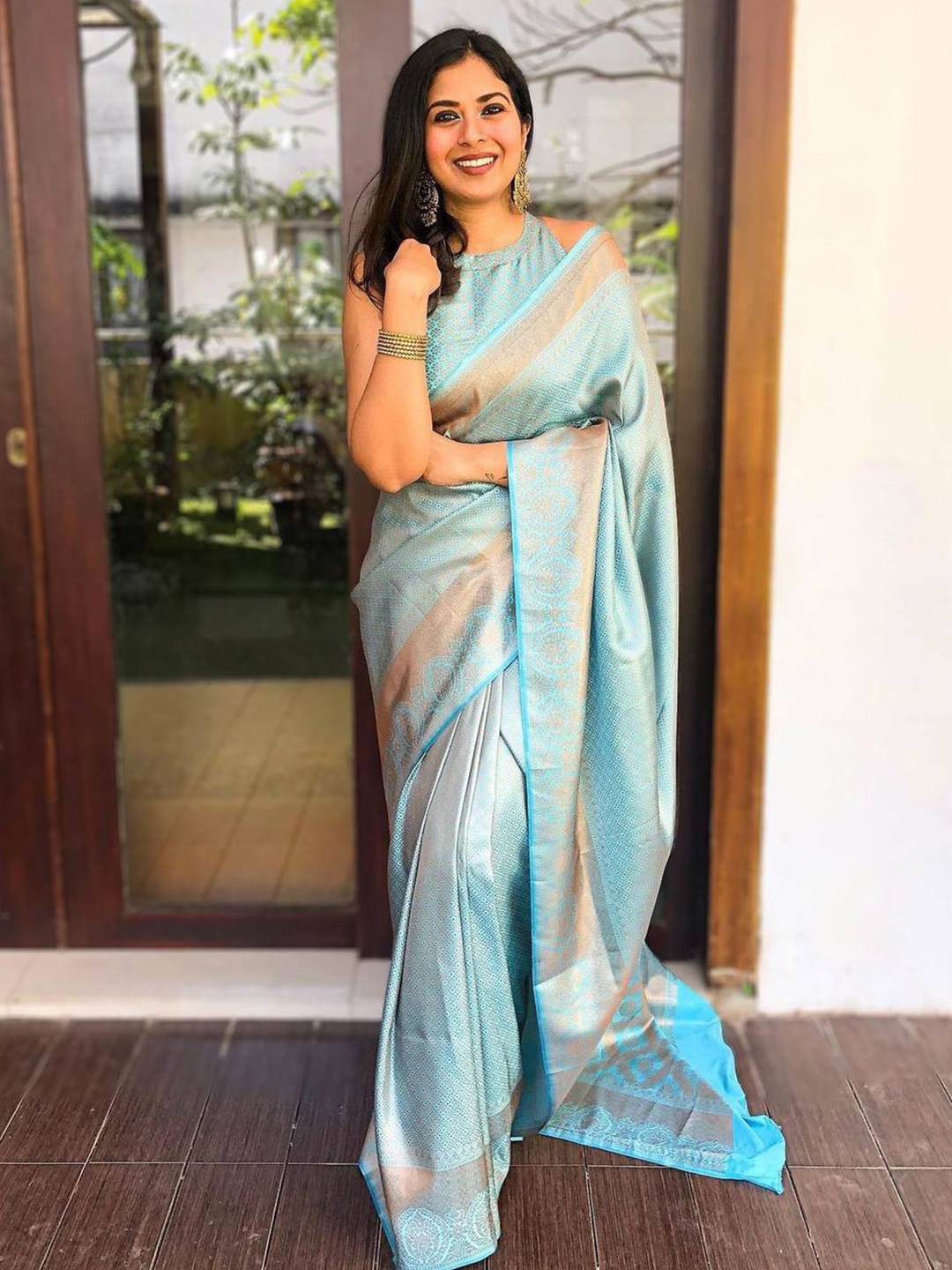 

Naishu Trendz Ethnic Motifs Woven Design Zari Pure Silk Kanjeevaram Saree, Sea green