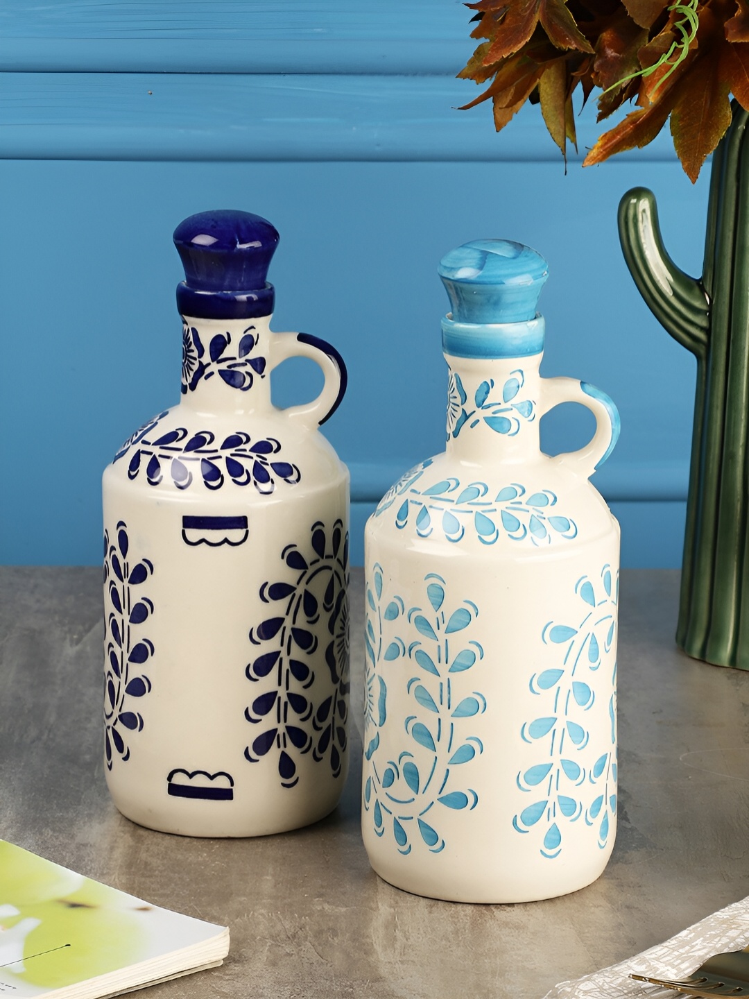 

The Decor Lane 2 Pieces White Ceramic Printed Ceramic Oil Dispenser 1L