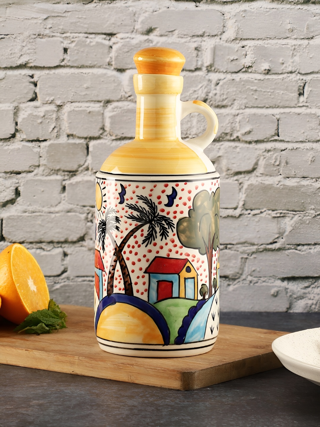 

The Decor Lane Yellow Ceramic Oil Dispenser 1 Ltr