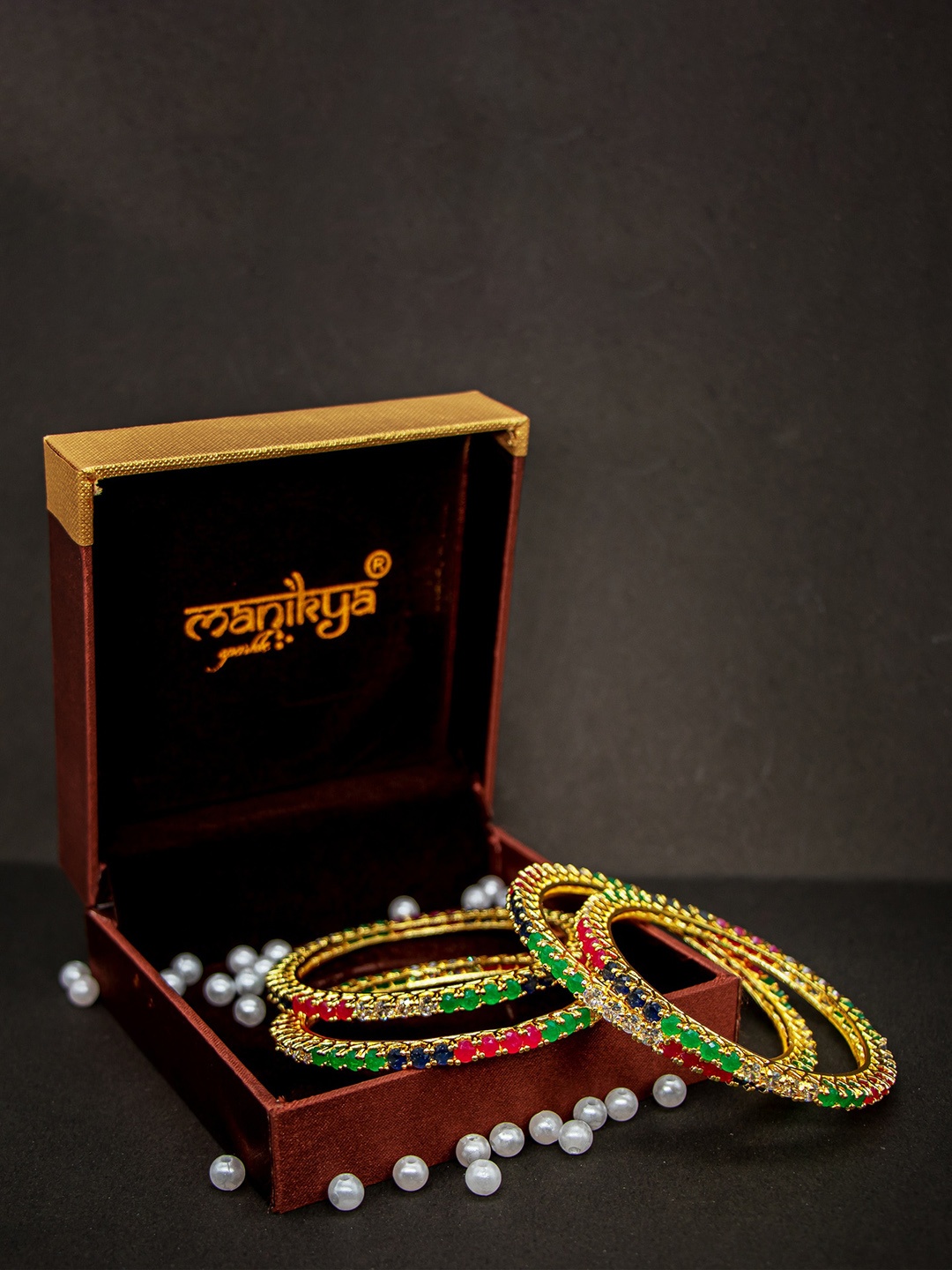 

Manikya Set Of 4 Gold-Plated AD-Studded Bangles