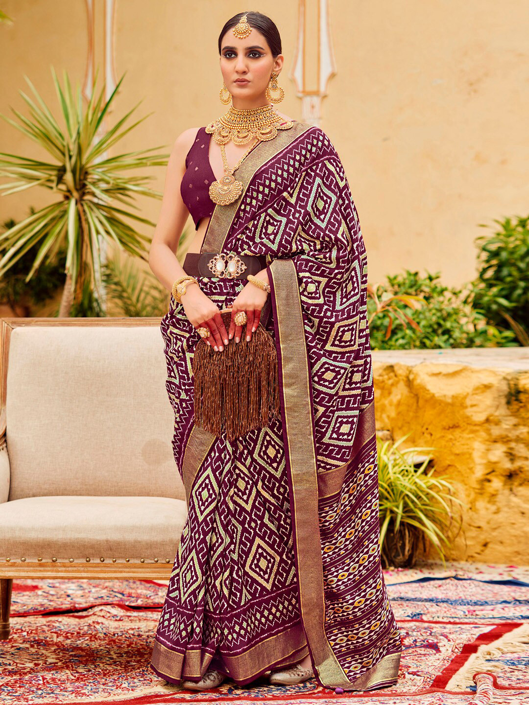 

Saree mall Ethnic Motifs Printed Ikat Sarees with Tassels, Purple