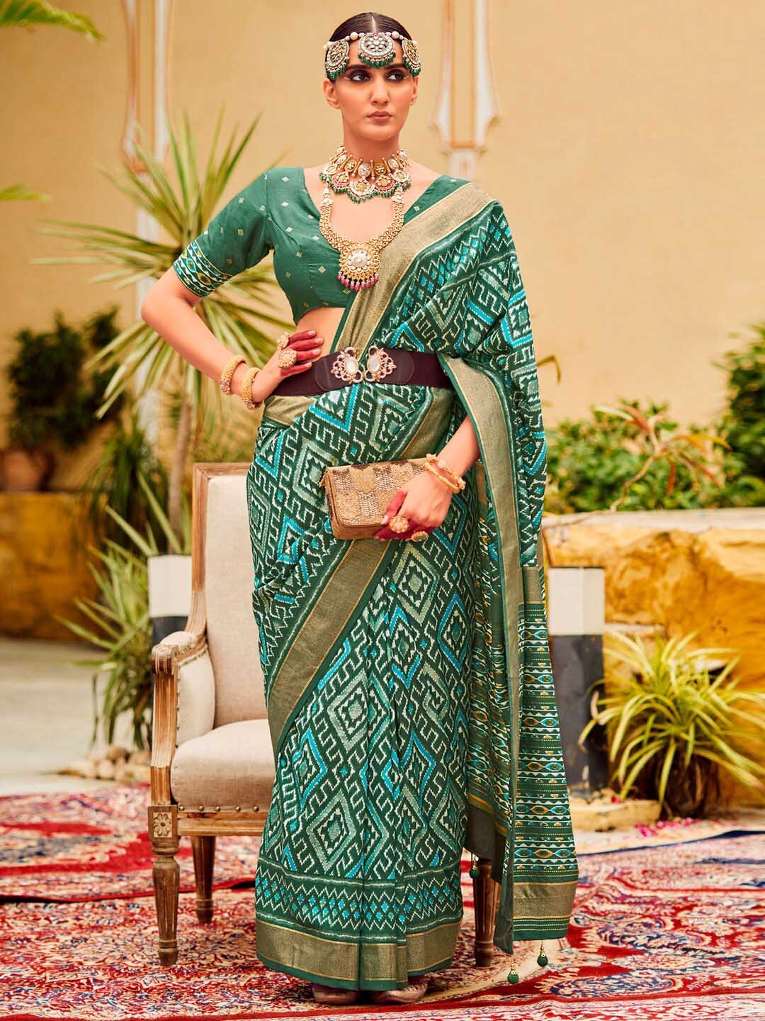 

Saree mall Geometric Printed Zari Ikat Saree with Tassels, Sea green