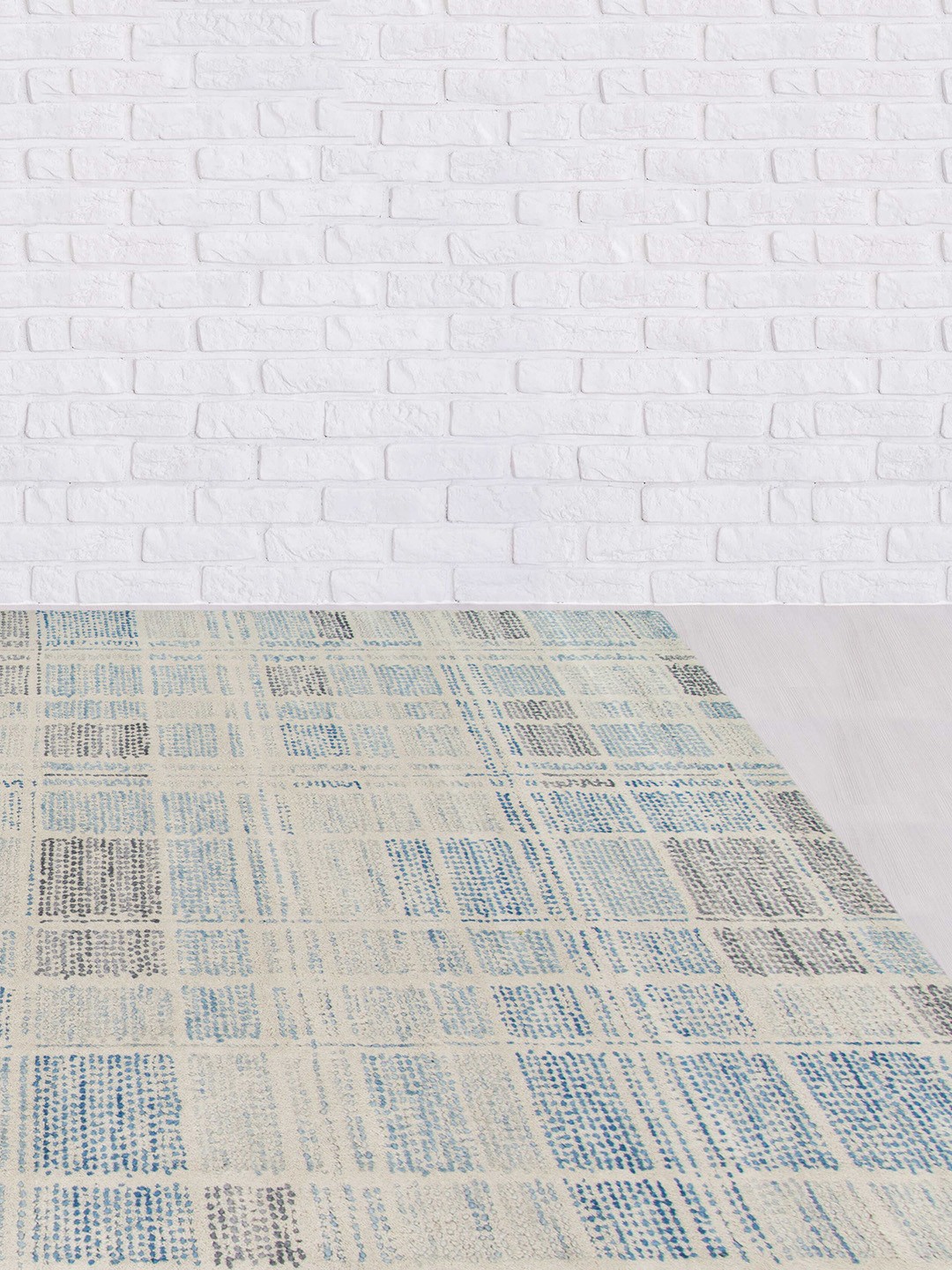

saraswatii global Blue Geometric Hand-Tufted Carpets