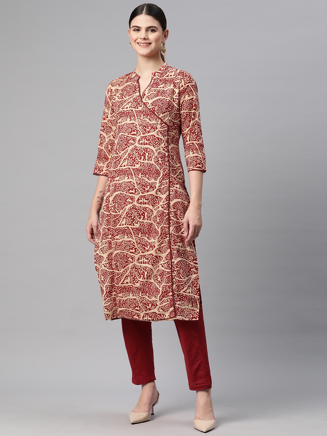 

Readiprint Fashions Women Printed Angrakha Sequinned Pure Cotton Kurta with Trousers, Maroon