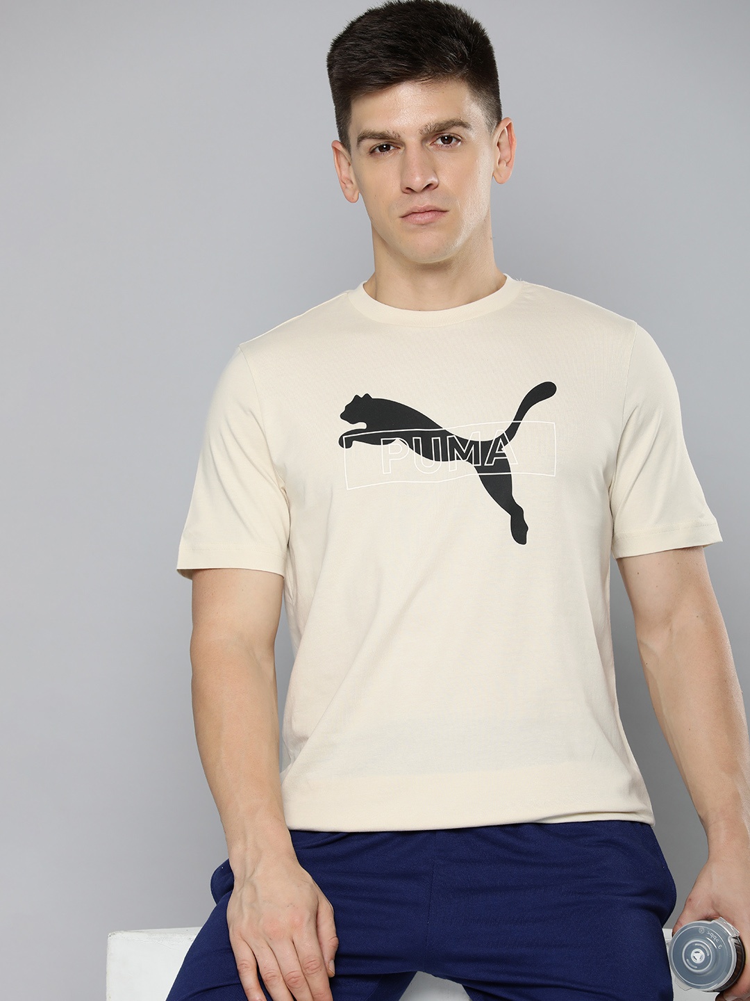 

Puma Men DESERT ROAD Graphic Brand Logo Printed Pure Cotton T-shirt, Cream