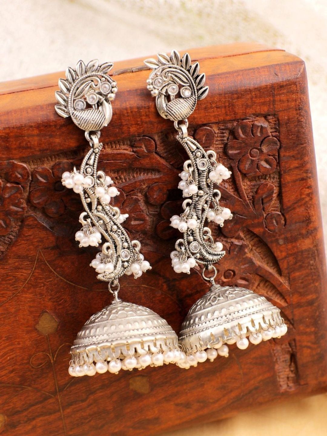 

Crunchy Fashion Silver-Plated Peacock Shaped Oxidised Jhumkas