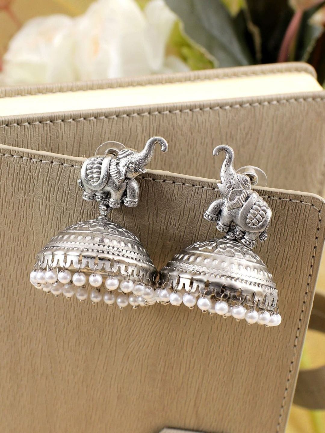 

Crunchy Fashion Silver-Plated Animal Shaped Oxidised Jhumkas
