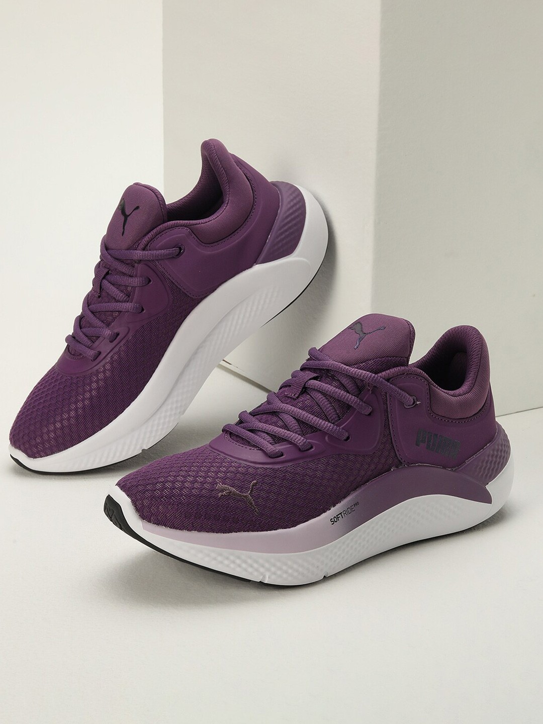 

Puma Women SOFTRIDE Pro Metachrome Running Shoes, Purple