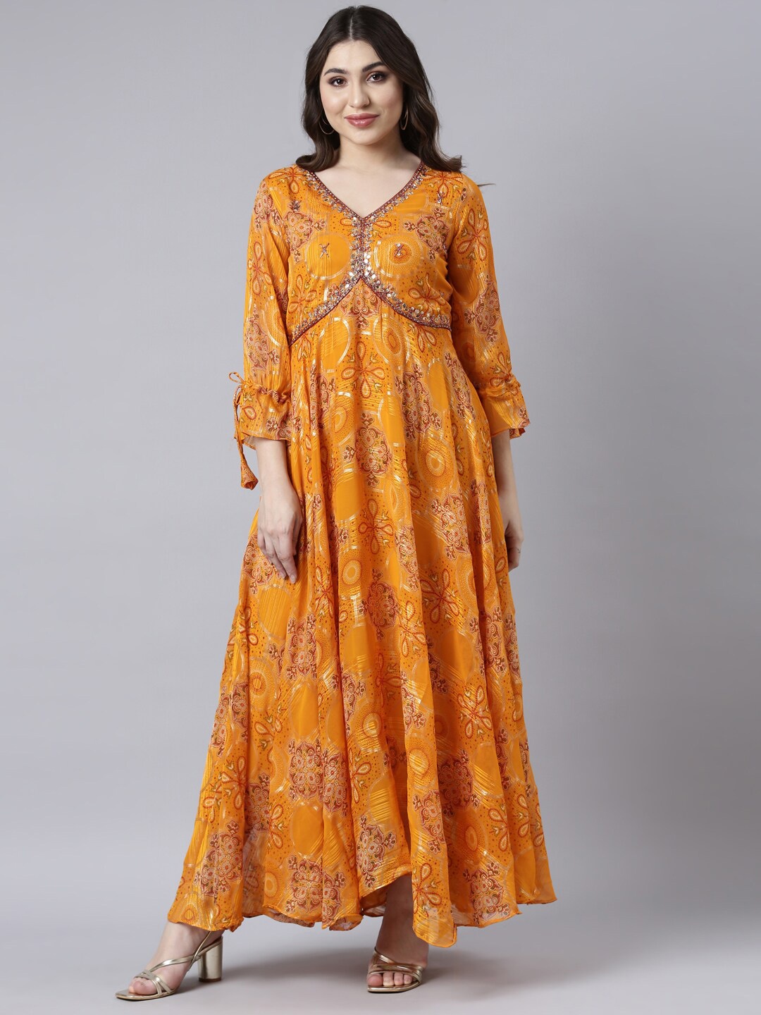 

Neerus Ethnic Motifs V Neck Printed Georgette Maxi Dress, Mustard