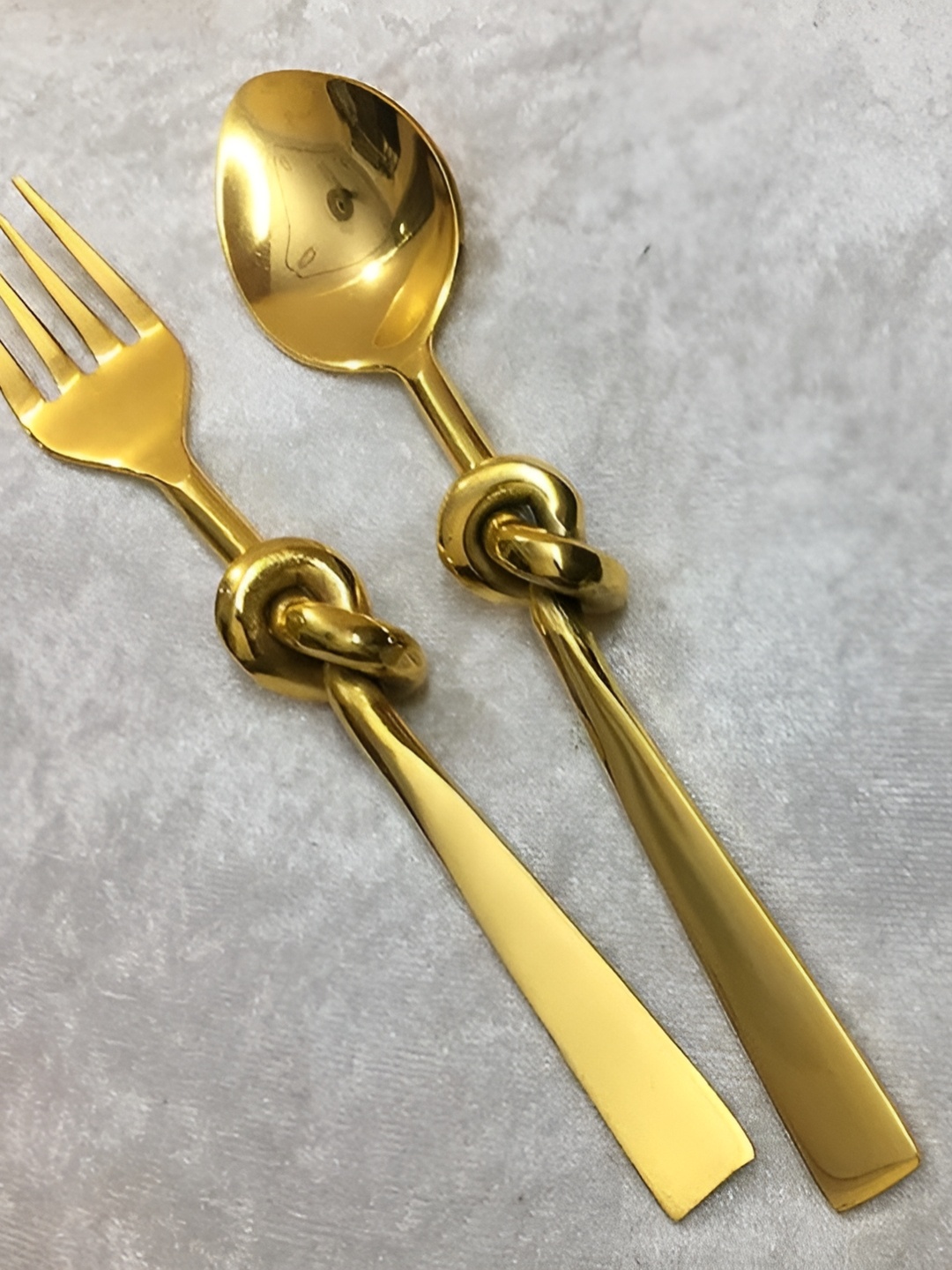 

Maverics Gold Toned 2 Pieces Textured Stainless Steel Spoon & Fork