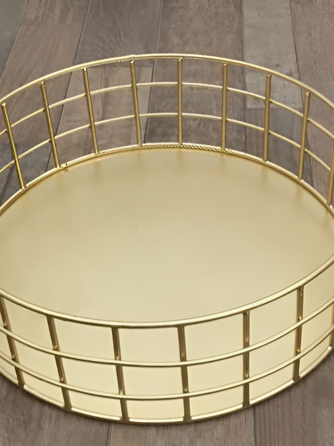 

Maverics Gold Toned Cast Iron Fruit Basket