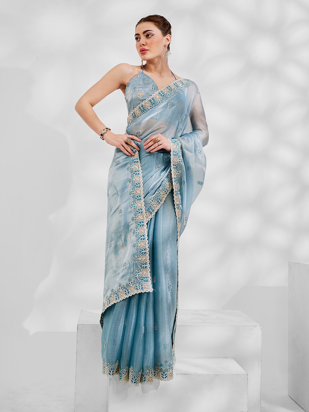

Kalista Turquoise Blue Embellished Embroidered Tissue Saree