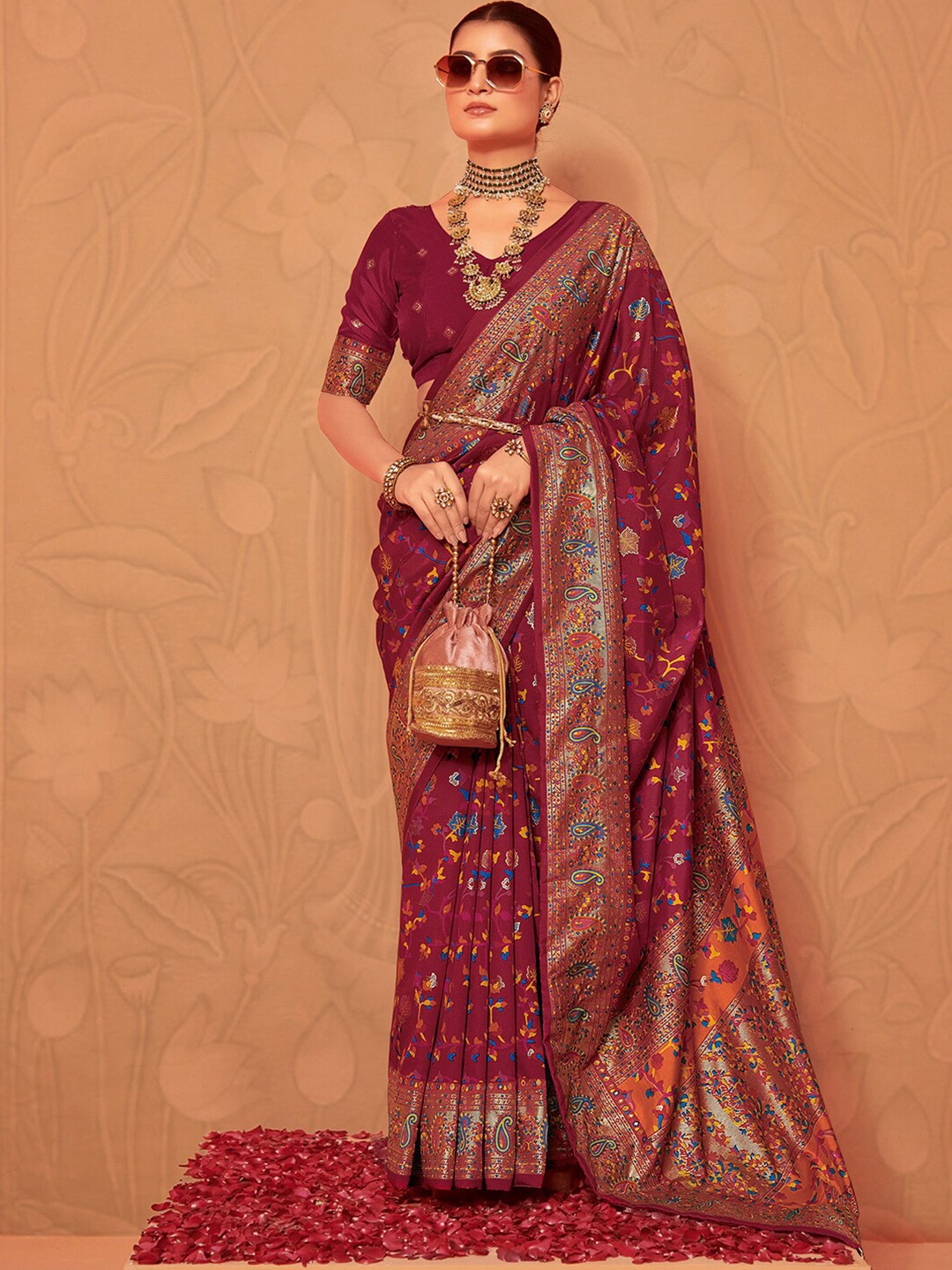 

Mitera Pink Ethnic Motifs Zari Sungudi Saree