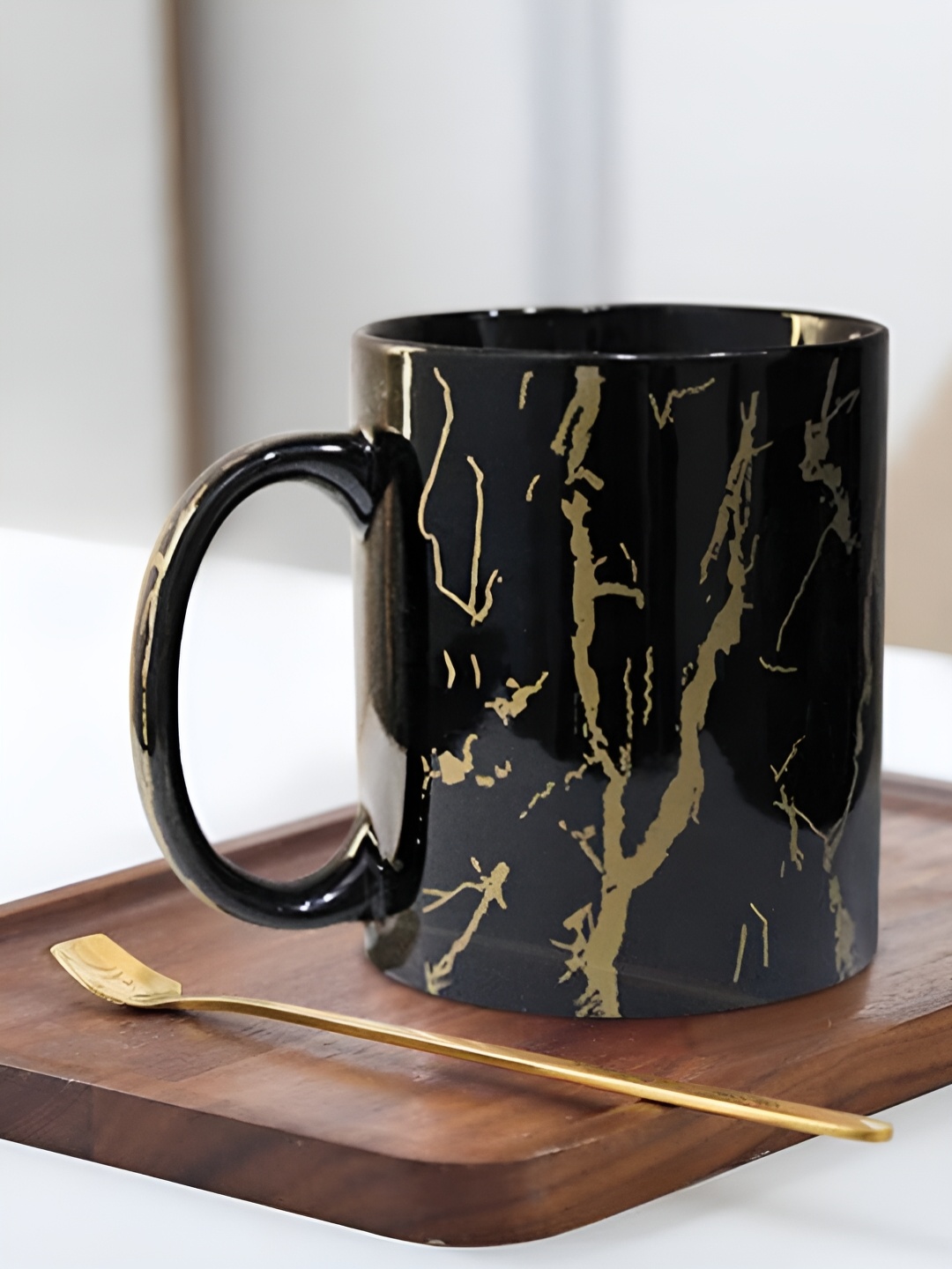 

The Earth Store Black & Brown Printed Microwave Safe Glossy Finish Ceramic Mug 370 ml