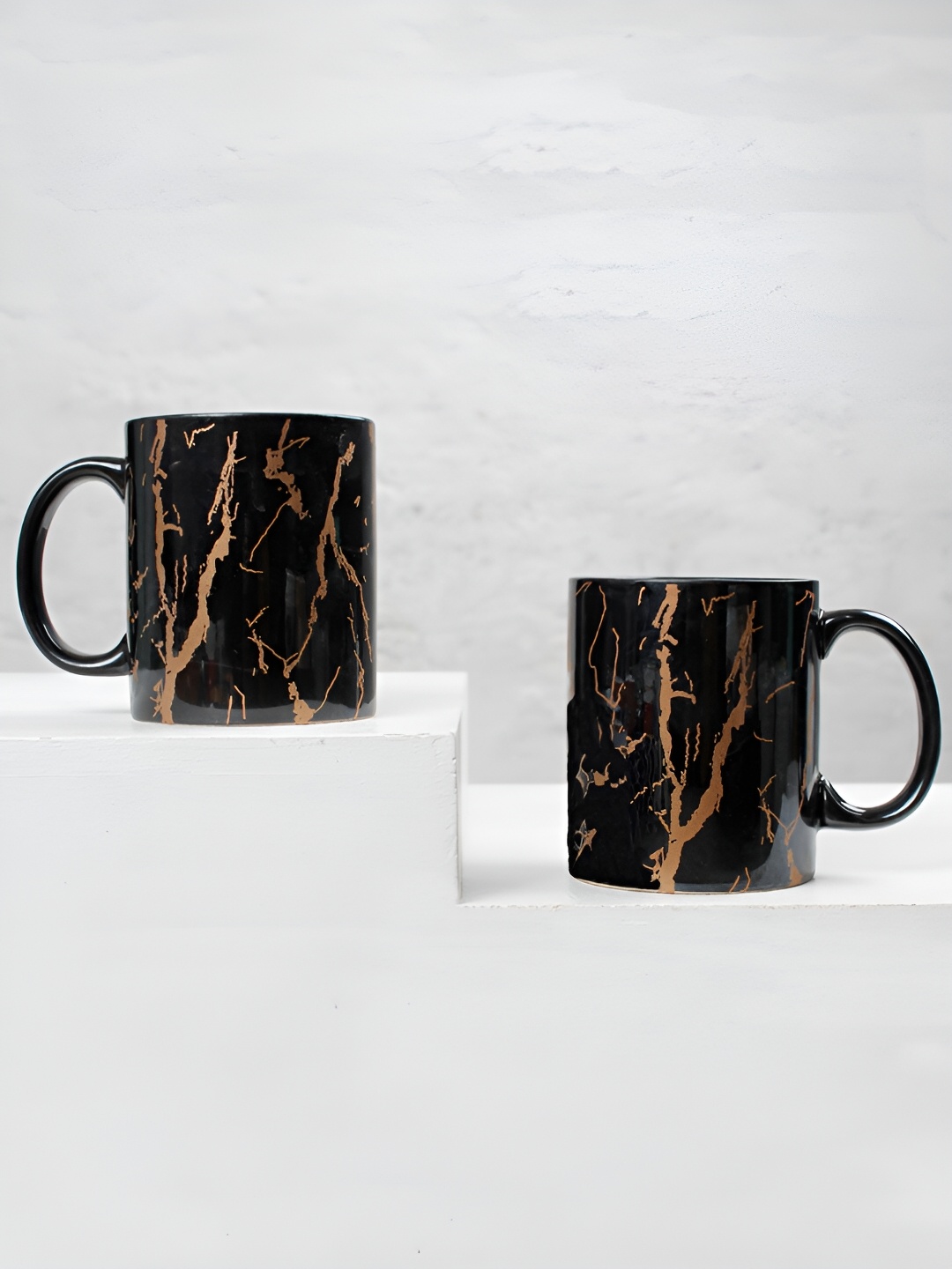 

The Earth Store Black 2 Pcs Printed Microwave Safe Glossy Finish Ceramic Mugs 370 ml Each