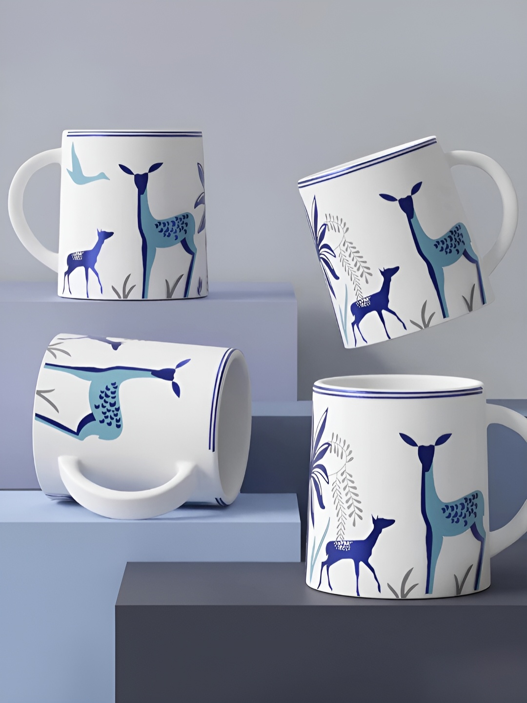 

The Earth Store White 4 Pcs Printed Microwave Safe Matte Finish Ceramic Mugs 300 ml Each