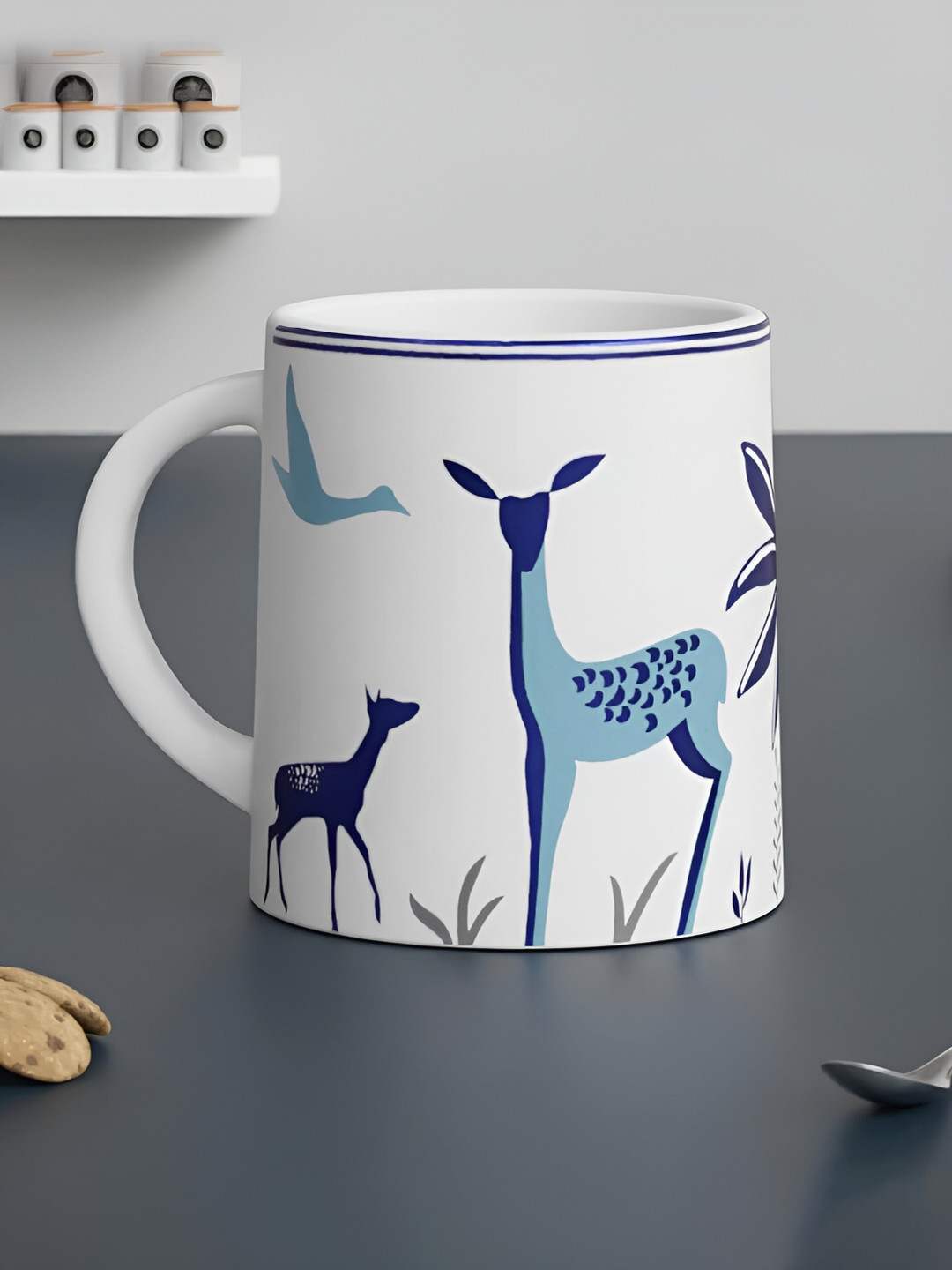 

The Earth Store White & Blue Printed Microwave Safe Ceramic Glossy Finish Mug 300 ml