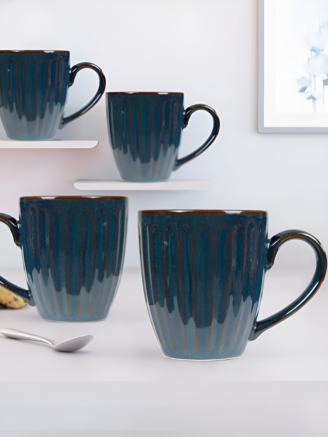 

The Earth Store Blue 4 Pcs Printed Microwave Safe Glossy Finish Ceramic Mugs 330 ml Each