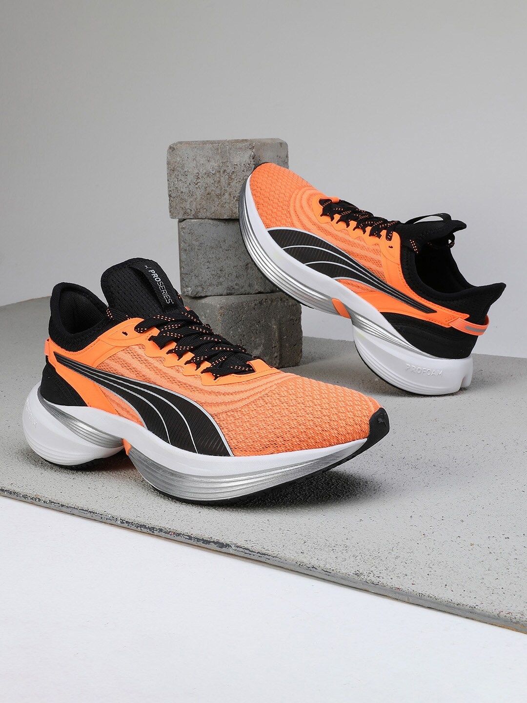 

Puma Unisex Conduct Pro Running Shoes, Orange