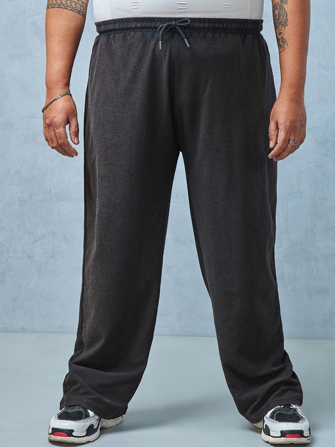

Bewakoof AIR Men Plus Size Relaxed Fit Mid-Rise Oversized Cotton Track Pant, Black
