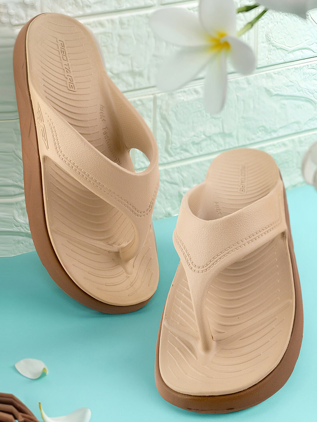 

Red Tape Women Textured Thong Flip-Flops, Beige