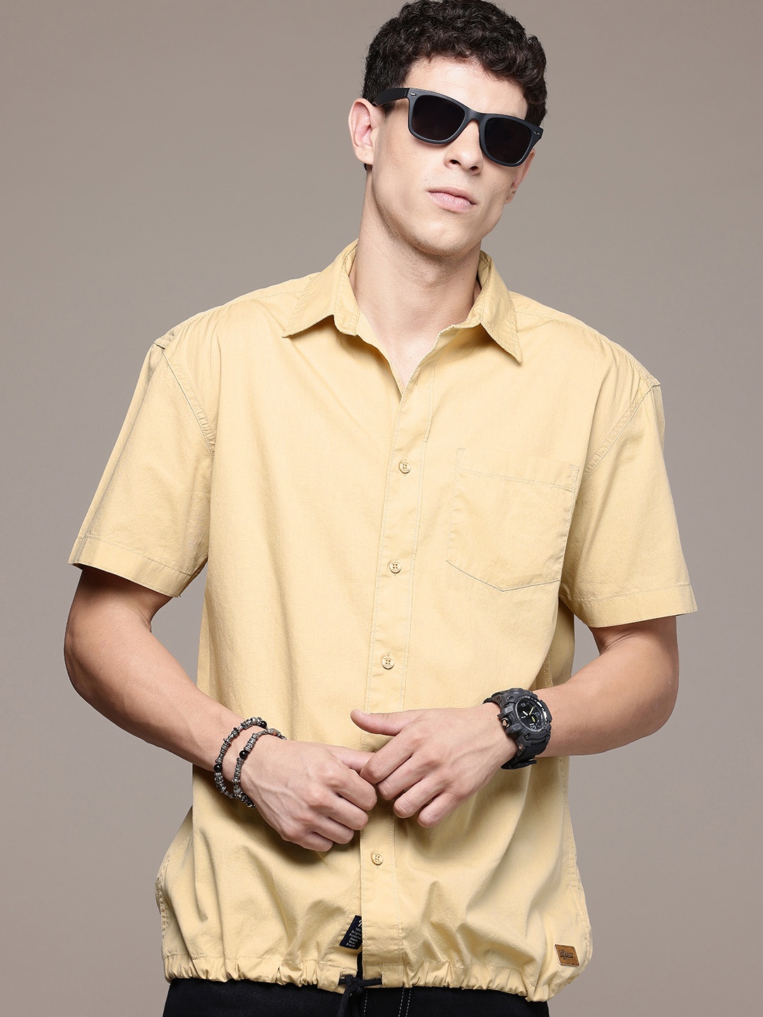

The Roadster Life Co. Solid Relaxed Fit Pure Cotton Casual Shirt, Beige