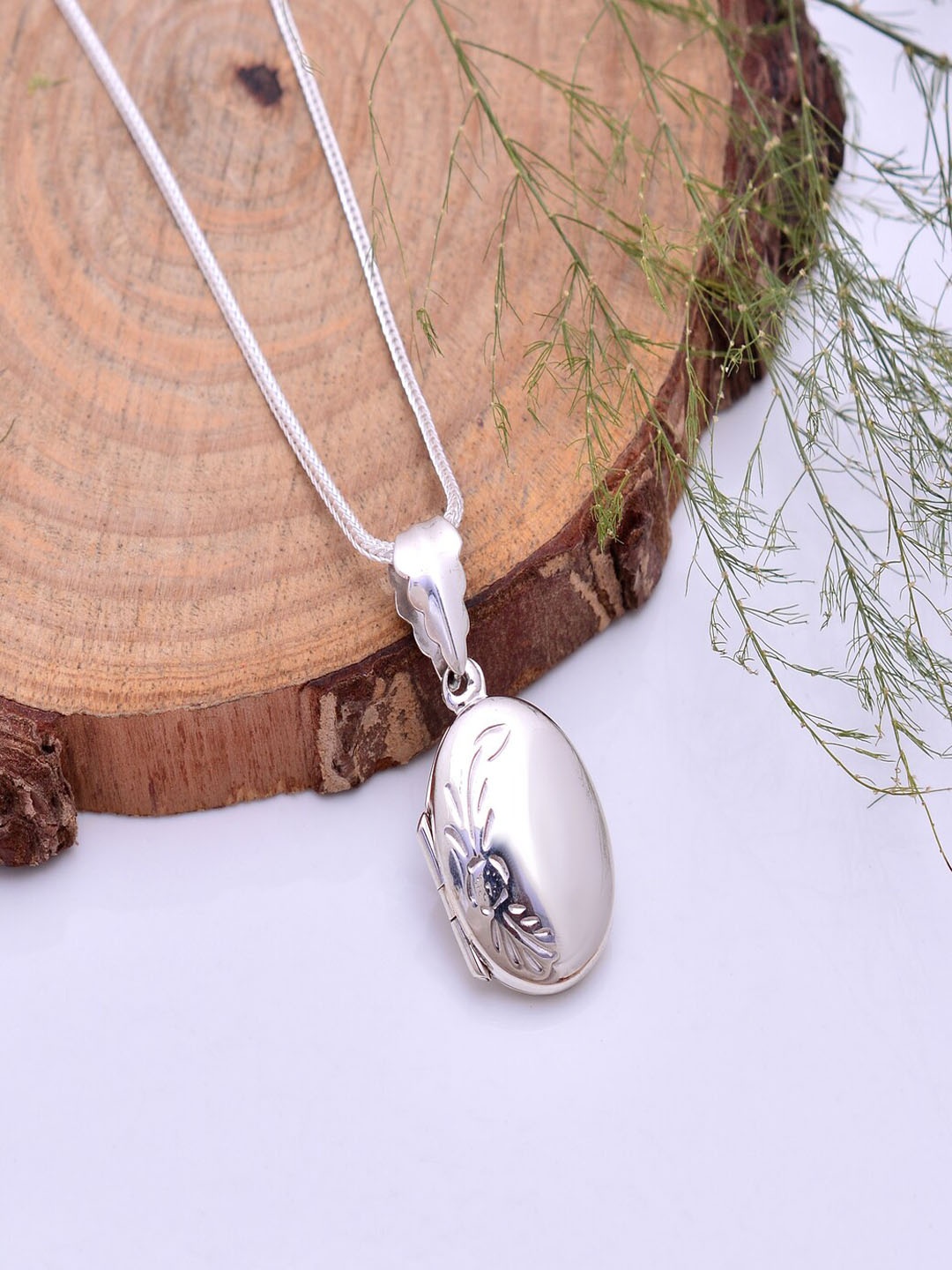 

Abhooshan 92.5 Sterling Silver Silver-Plated Photo Pendant with Chains