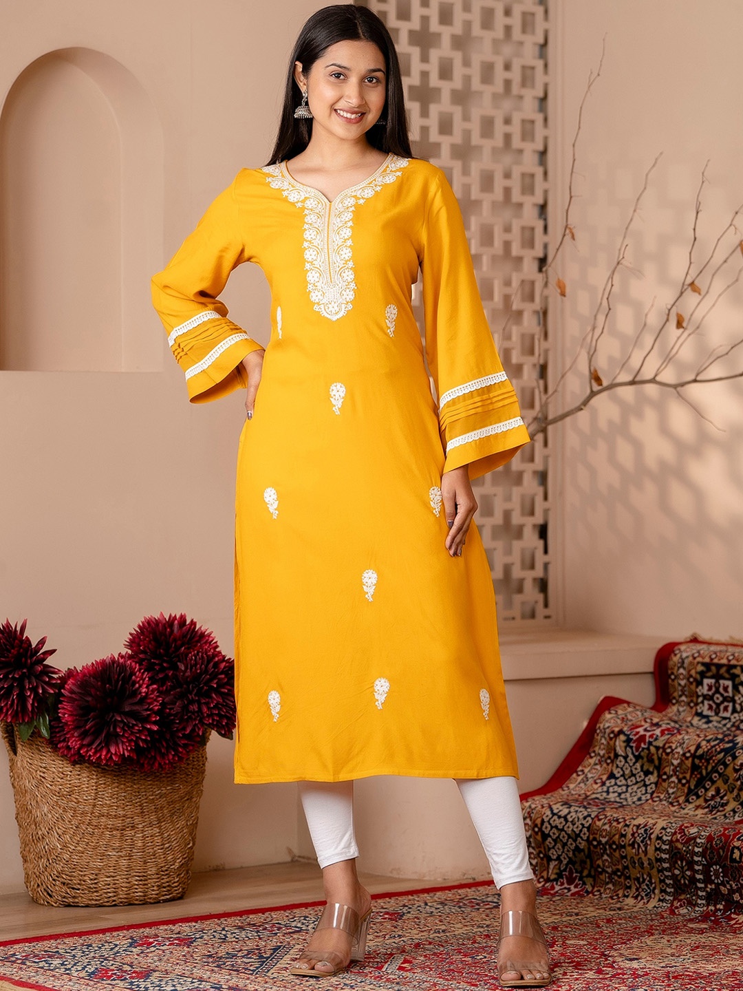 

Charu Ethnic Motifs Embroidered Flared Sleeves Thread Work Kurta, Mustard