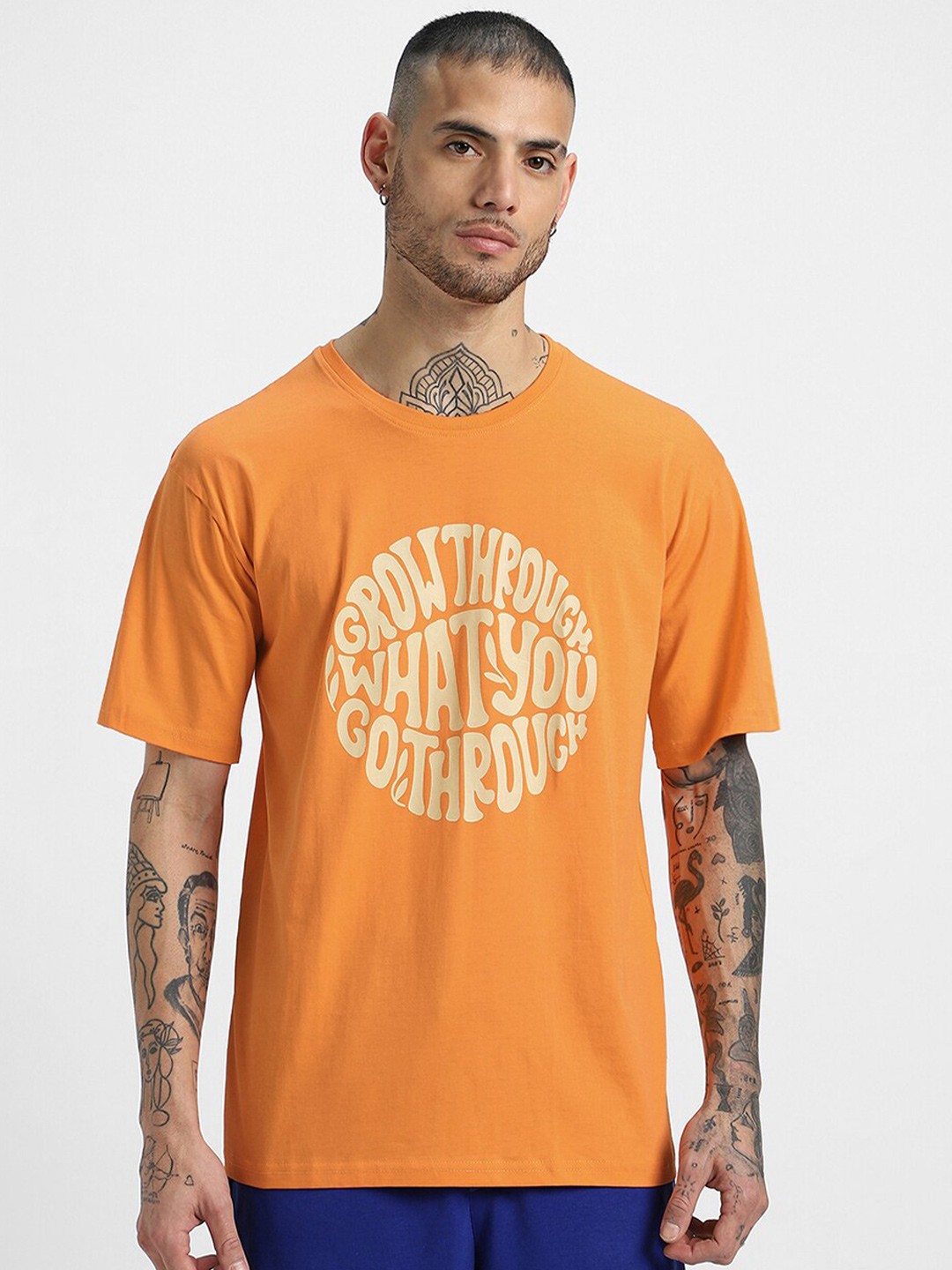 

VEIRDO Typography Printed Round Neck Drop-Shoulder Sleeves Pure Cotton Oversized T-shirt, Orange