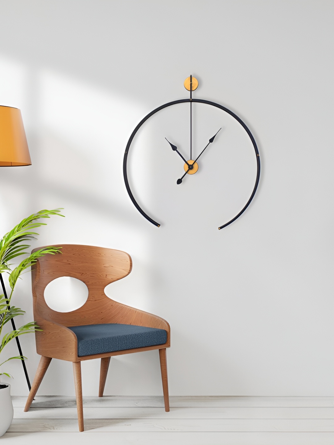 

Craftter Black & Gold Toned Round Shaped Contemporary Wall Clock