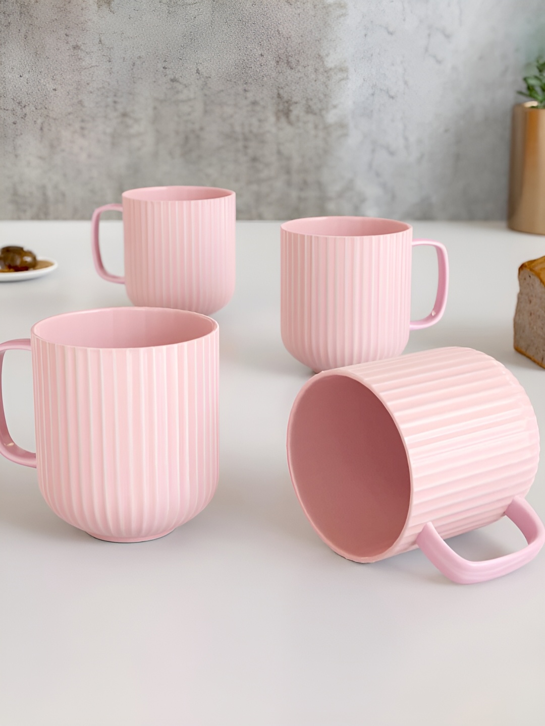 

The Earth Store Pink 4 Pcs Textured Microwave Safe Glossy Finish Ceramic Mugs 340 ml Each