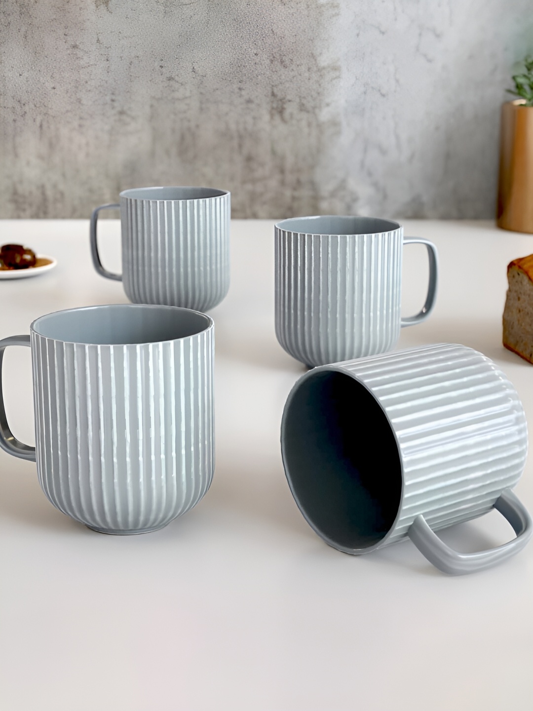 

The Earth Store Grey 4 Pcs Textured Microwave Safe Glossy Finish Ceramic Mugs 340 ml Each