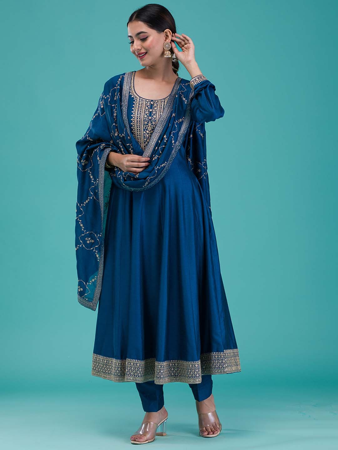 

Koskii Women Floral Yoke Design Thread Work Silk Crepe Kurta with Trousers & With Dupatta, Blue