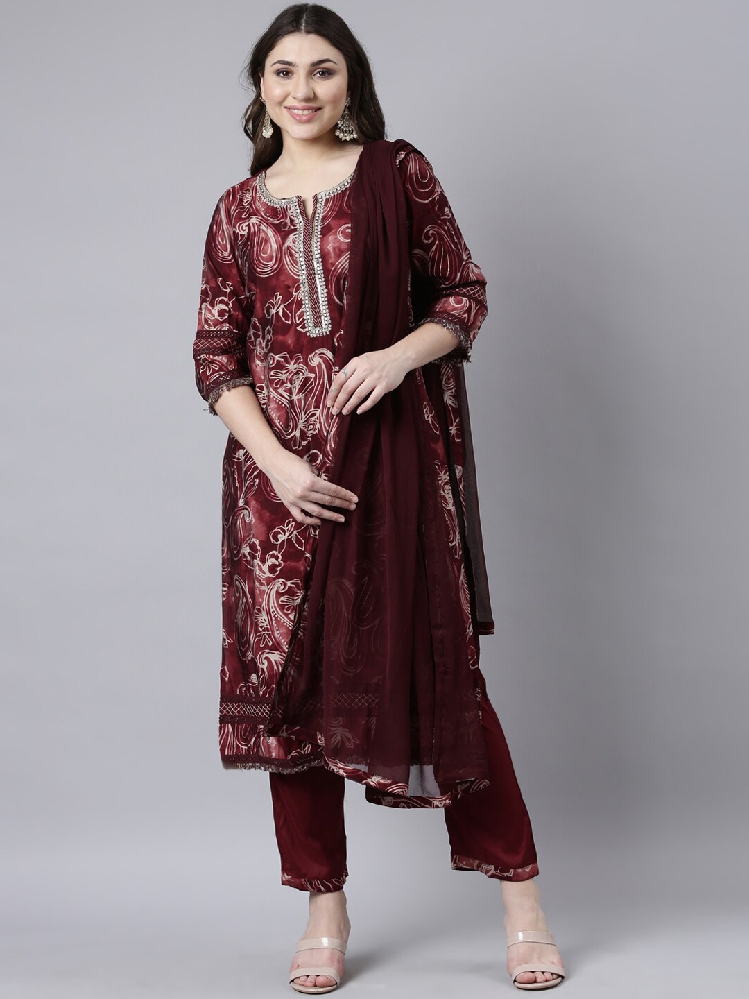 

Neerus Women Paisley Printed Regular Aari Work Kurta with Trousers & With Dupatta, Maroon